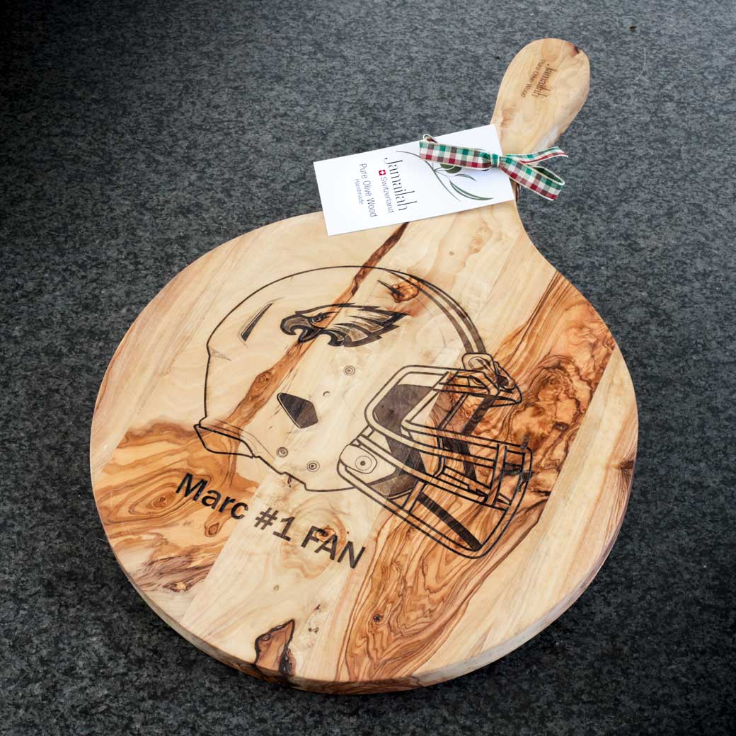 Olive wood serving board with NFL fan engraving