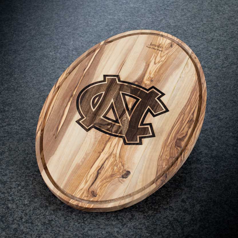 Oval charcuterie board with college engraving